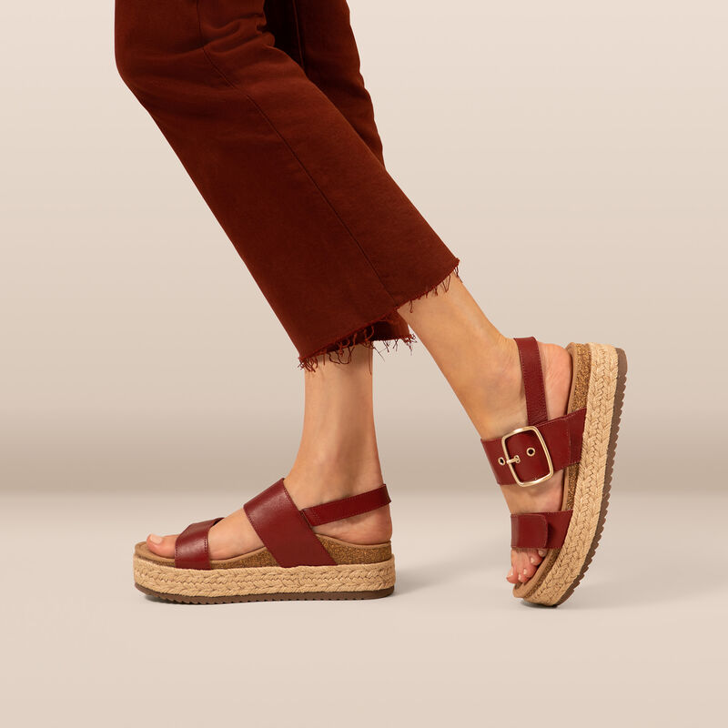 Red platform sandal on foot